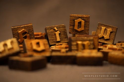 engraved wooden pieces